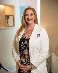 Dr. Carmen Kavali